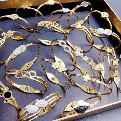 comprare Gioielli di diamanti, zirconi, titanio, acciaio, non macchiato, misto, oro assortito, braccialetto per polso fabbricazione online